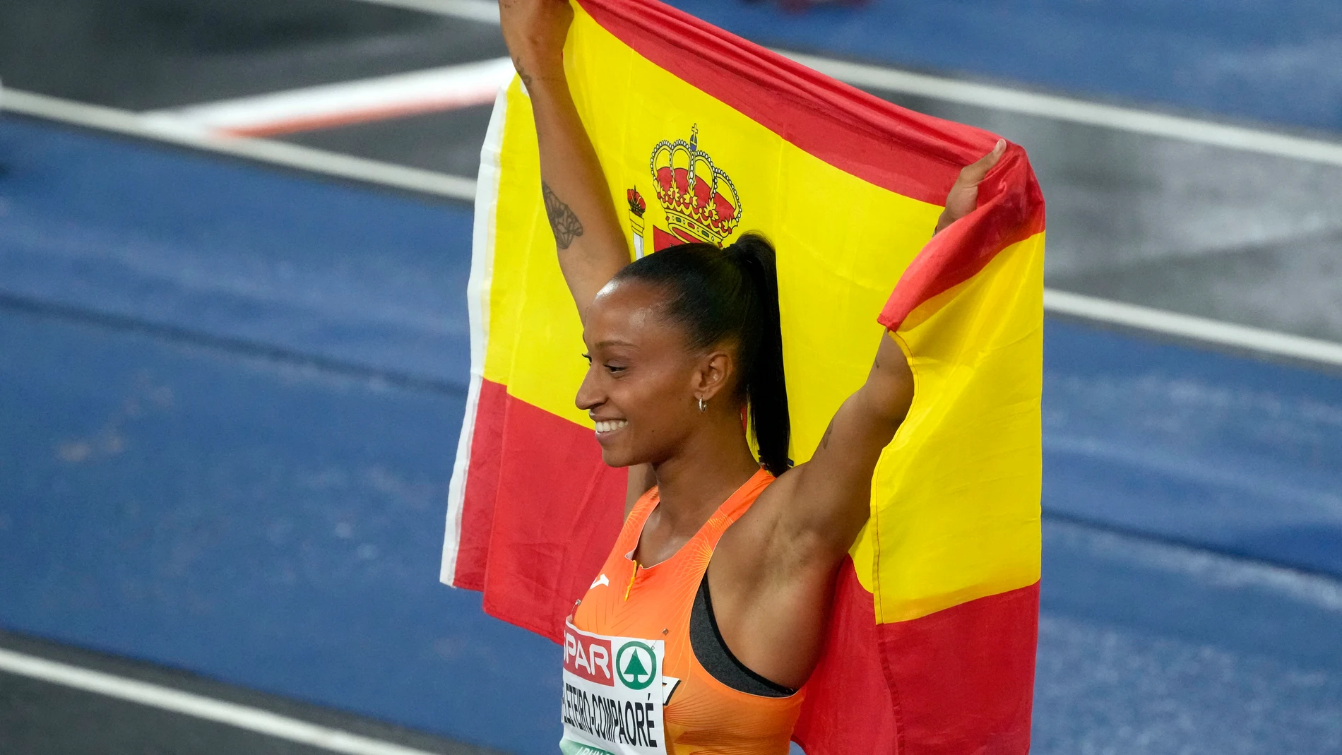 Ana Peleteiro-Compaore, of Spain, celebrates after winning the gold medal in the women's triple jump final at the European Athletics Championships in Rome, Sunday, June 9, 2024. (AP Photo/Gregorio Borgia)