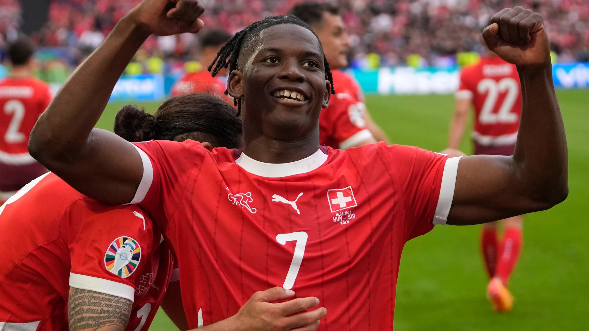 Switzerland's Breel Embolo celebrates after scoring his side's third goal during a Group A match between Hungary and Switzerland at the Euro 2024 soccer tournament in Cologne, Germany, Saturday, June 15, 2024. (AP Photo/Darko Vojinovic)
