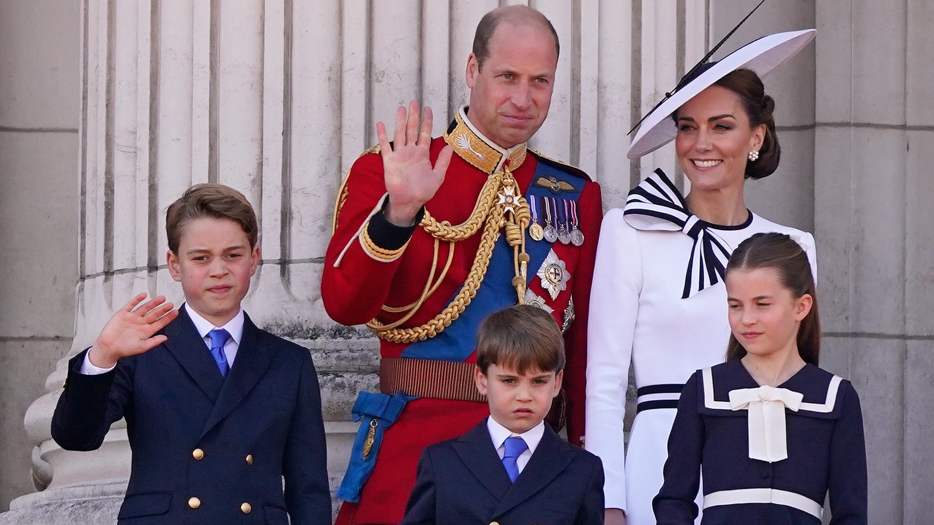 Prince William, and Kate Princess of Wales on the balcony of Buckingham Palace with their children Prince George, left, Prince Louis, front centre, and Princess Charlotte wave to the crowds after the Trooping the Color ceremony, in London, Saturday, June 15, 2024. Trooping the Color is the King's Birthday Parade and one of the nation's most impressive and iconic annual events attended by almost every member of the Royal Family. (AP Photo/Alberto Pezzali)