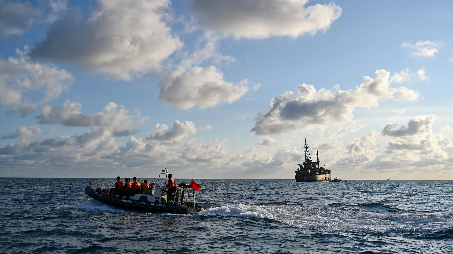 SANSHA, June 4, 2024 -- Law enforcers of China Coast Guard inspect near an illegally grounded Philippine navy transport ship on May 16, 2024. Recently, in China's Ren'ai Jiao and the surrounding territorial sea, personnel from the illegally grounded Philippine navy transport ship Sierra Madre repeatedly damaged Chinese fishermen's nets. It is estimated that over 2,000 meters of fishing nets have been damaged and more than 100 meters of fishing nets have been stolen by Philippine personnel fr...