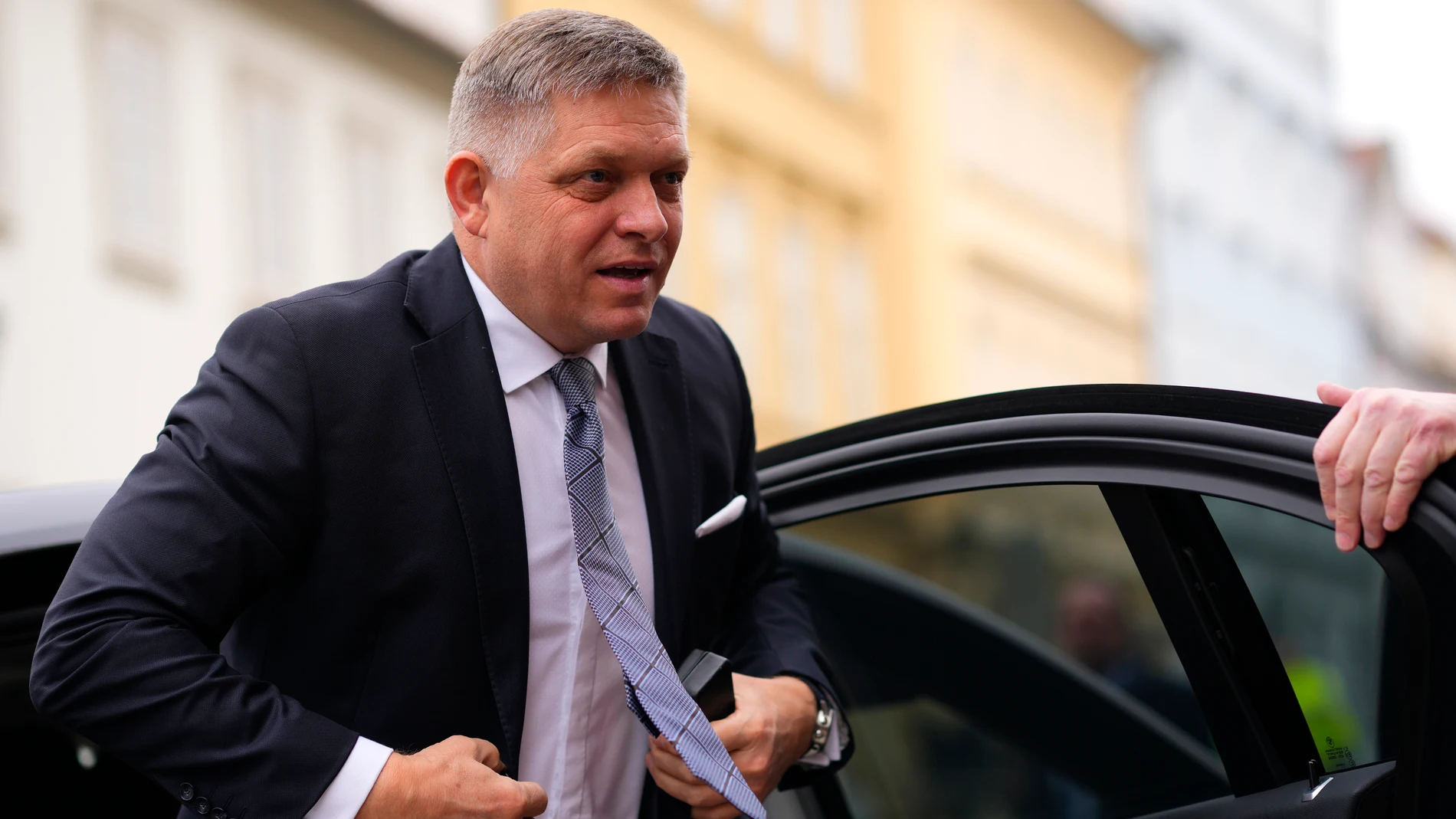 FILE - Slovakia's Prime Minister Robert Fico arrives for the V4 meeting in Prague, Czech Republic, Tuesday, Feb. 27, 2024. Slovakia’s parliament voted on Thursday, June 20, 2024 to approve a government plan to overhaul the country’s public radio and television services, a move that critics say would result in the government taking full control of the media. (AP Photo/Petr David Josek, File)
