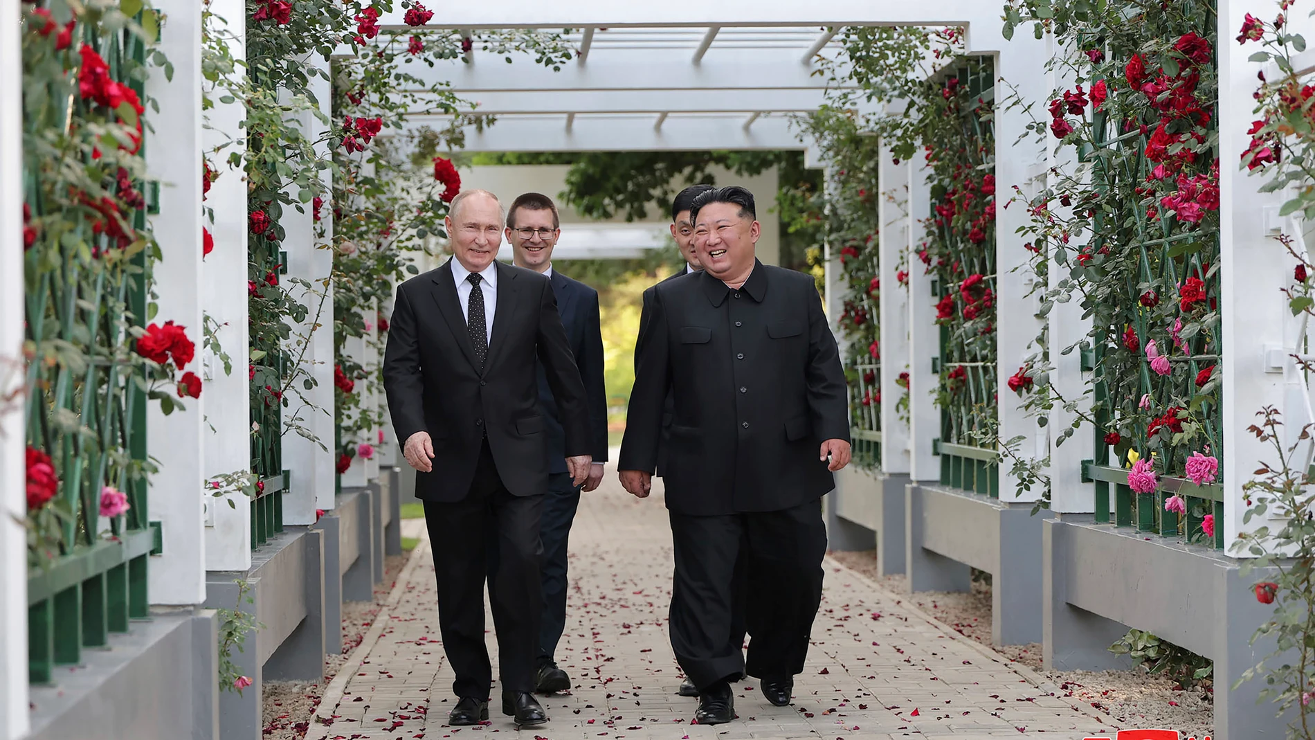 In this photo provided by the North Korean government, North Korean leader Kim Jong Un, right, and Russia's President Vladimir Putin, left, walk through a garden of the Kumsusan State Guest House in Pyongyang, North Korea Wednesday, June 19, 2024. Independent journalists were not given access to cover the event depicted in this image distributed by the North Korean government. The content of this image is as provided and cannot be independently verified. Korean language watermark on image as ...