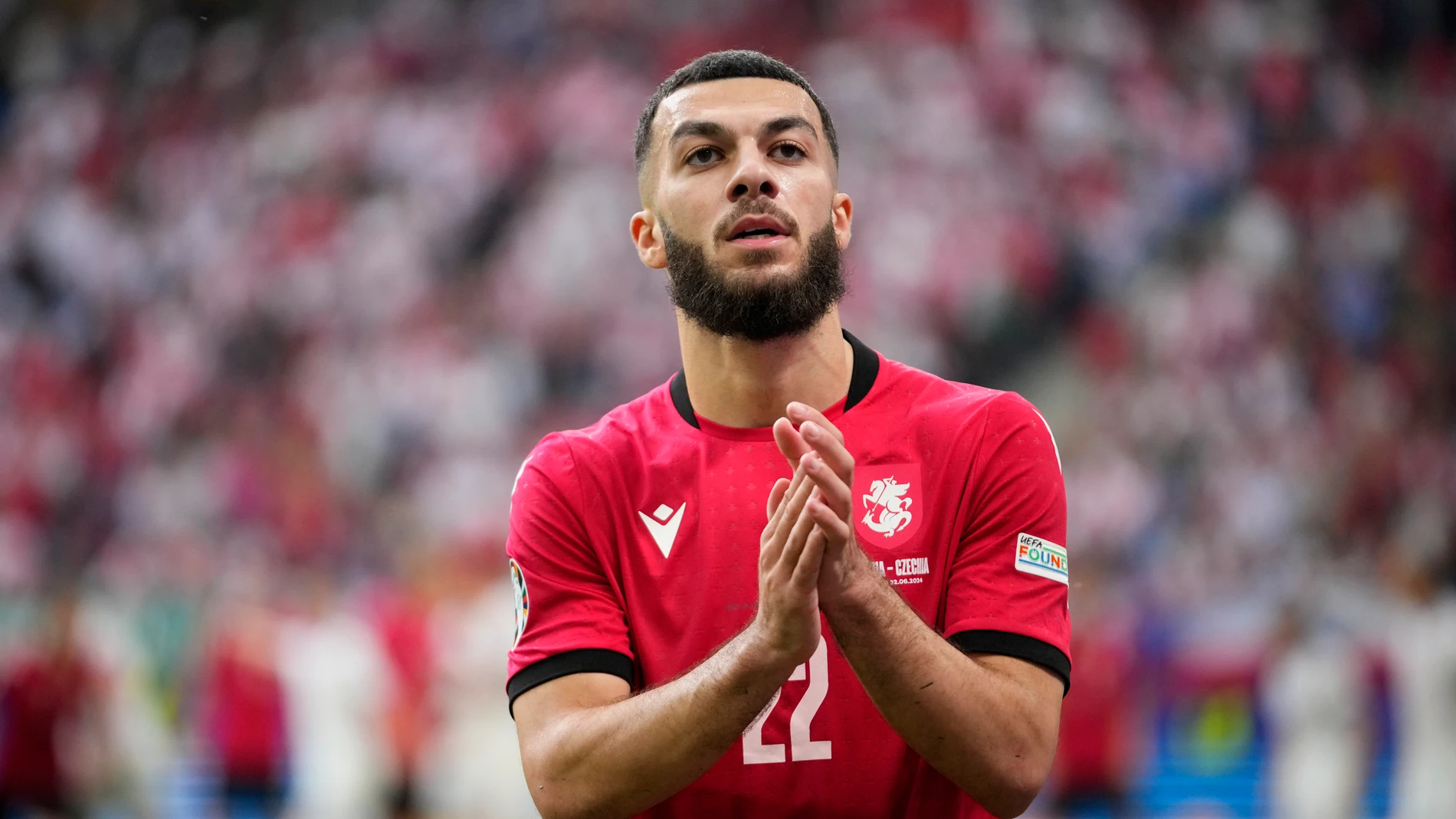 Georgia's Georges Mikautadze claps his hands during a Group F match between Georgia and the Czech Republic at the Euro 2024 soccer tournament in Hamburg, Germany, Saturday, June 22, 2024. (AP Photo/Petr David Josek)