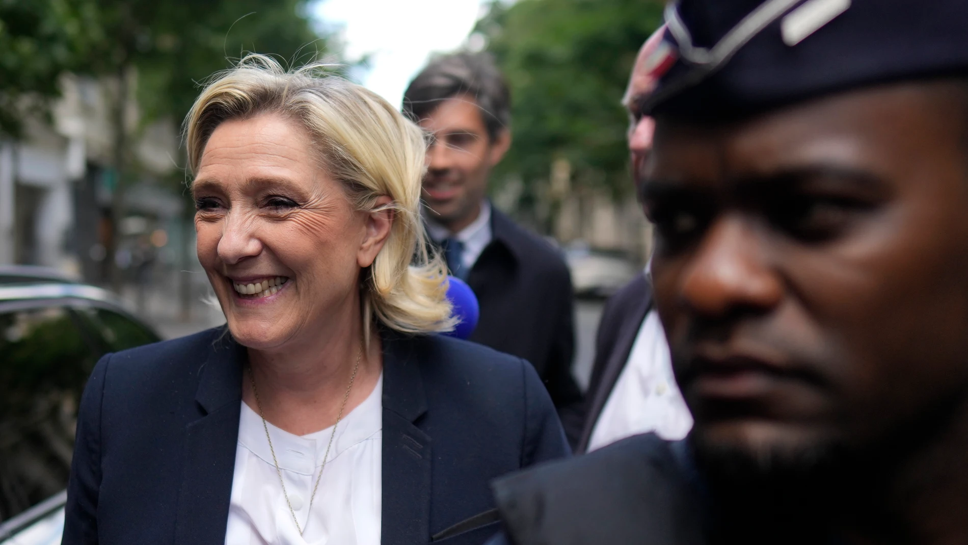 Far-right leader Marine Le Pen arrives at the National Rally party headquarters, Thursday, July 4, 2024 in Paris. The National Rally secured the most votes in the first round of the early legislative elections on June 30 but not enough to claim an overall victory that would allow the formation of France's first far-right government since World War II. (AP Photo/Thibault Camus)