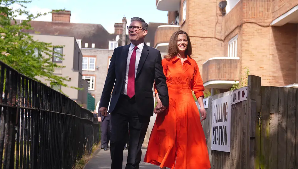 UK Labour leader Keir Starmer and his wife Victoria arrive to cast their votes in the UK 2024 General Election at Willingham Close TRA Hall in London.