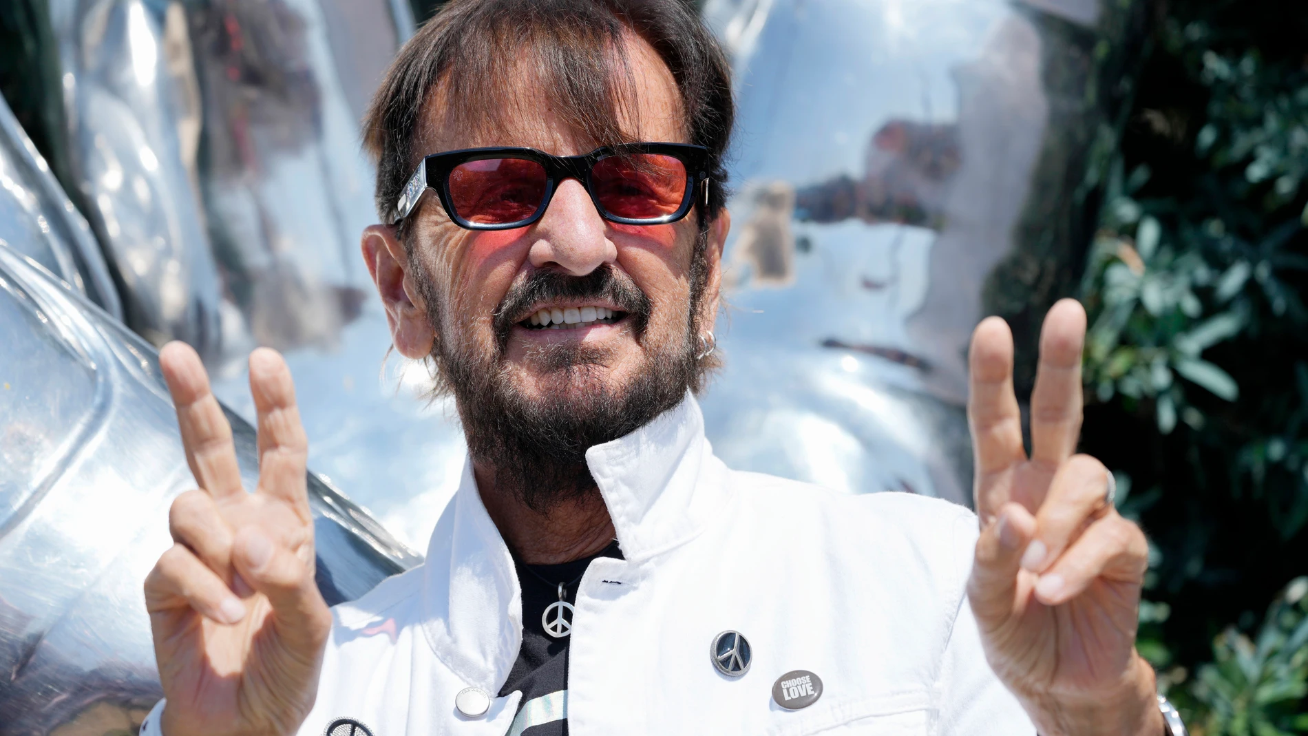 Ringo Starr poses at his annual Peace and Love Birthday Celebration at Beverly Hills Garden Park, Sunday, July 7, 2024, in Beverly Hills, Calif. Starr turned 84 Sunday. (AP Photo/Chris Pizzello)
