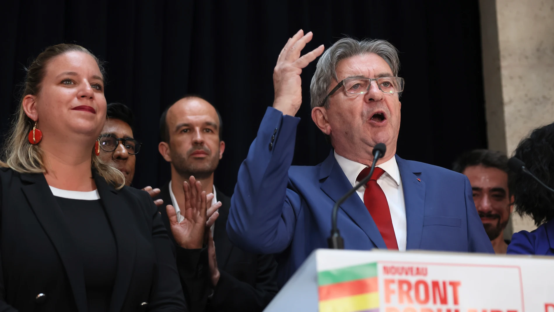 Far-left La France Insoumise - LFI - (France Unbowed) founder Jean-Luc Melenchon delivers a speech at the party election night headquarters, Sunday, July 7, 2024 in Paris. A coalition on the left that came together unexpectedly ahead of France's snap elections won the most parliamentary seats in the vote, according to polling projections Sunday. The surprise projections put President Emmanuel Macron's centrist alliance in second and the far right in third. At left is LFI's Mathilde Pant and a...