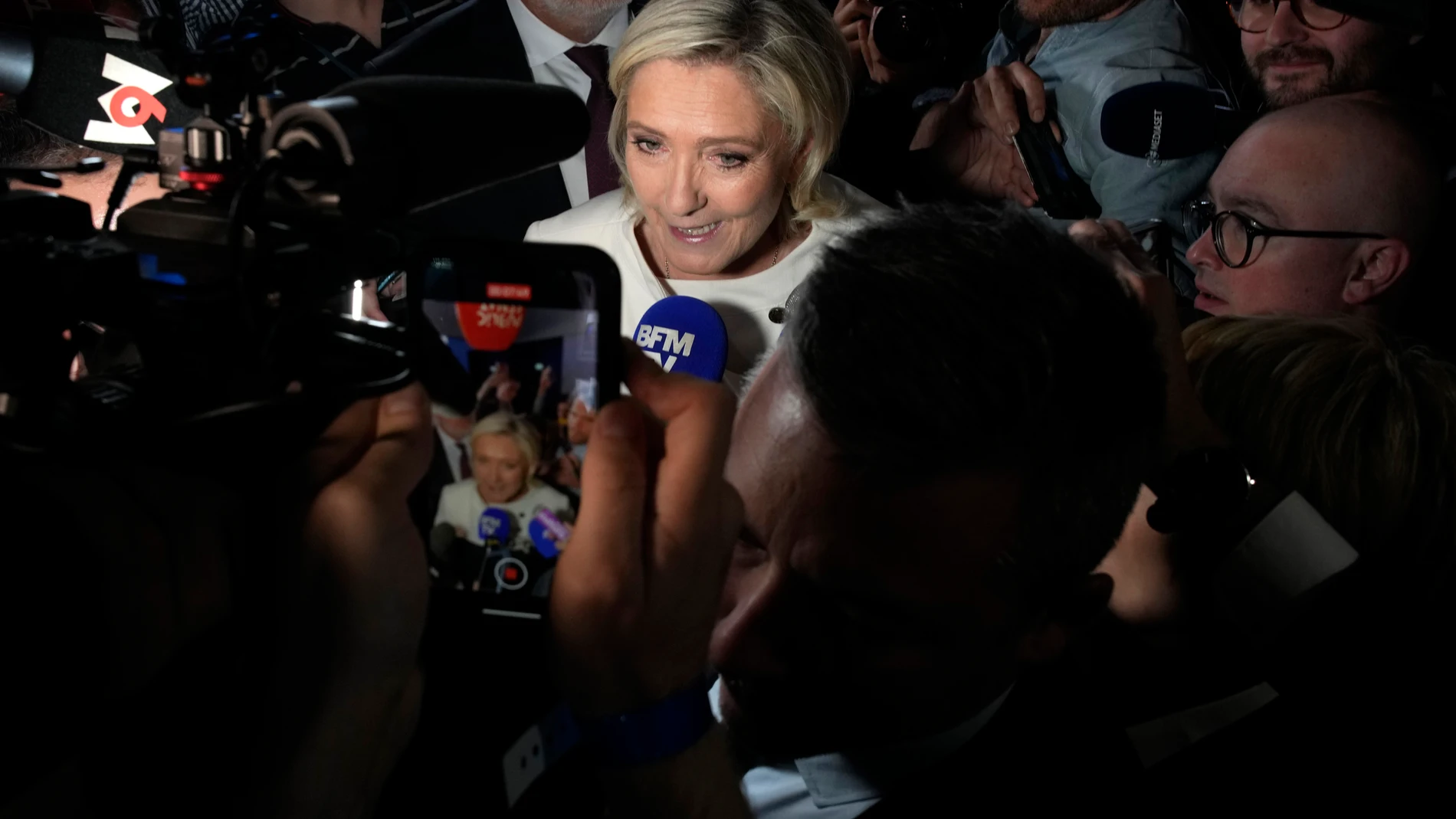Far-right National Rally party leader Marine Le Pen answers reporters after the second round of the legislative election, Sunday, July 7, 2024 at the party election night headquarters in Paris. A coalition on the left that came together unexpectedly ahead of France's snap elections won the most parliamentary seats in the vote, according to polling projections Sunday. The surprise projections put President Emmanuel Macron's centrist alliance in second and the far right in third. (AP Photo/Loui...