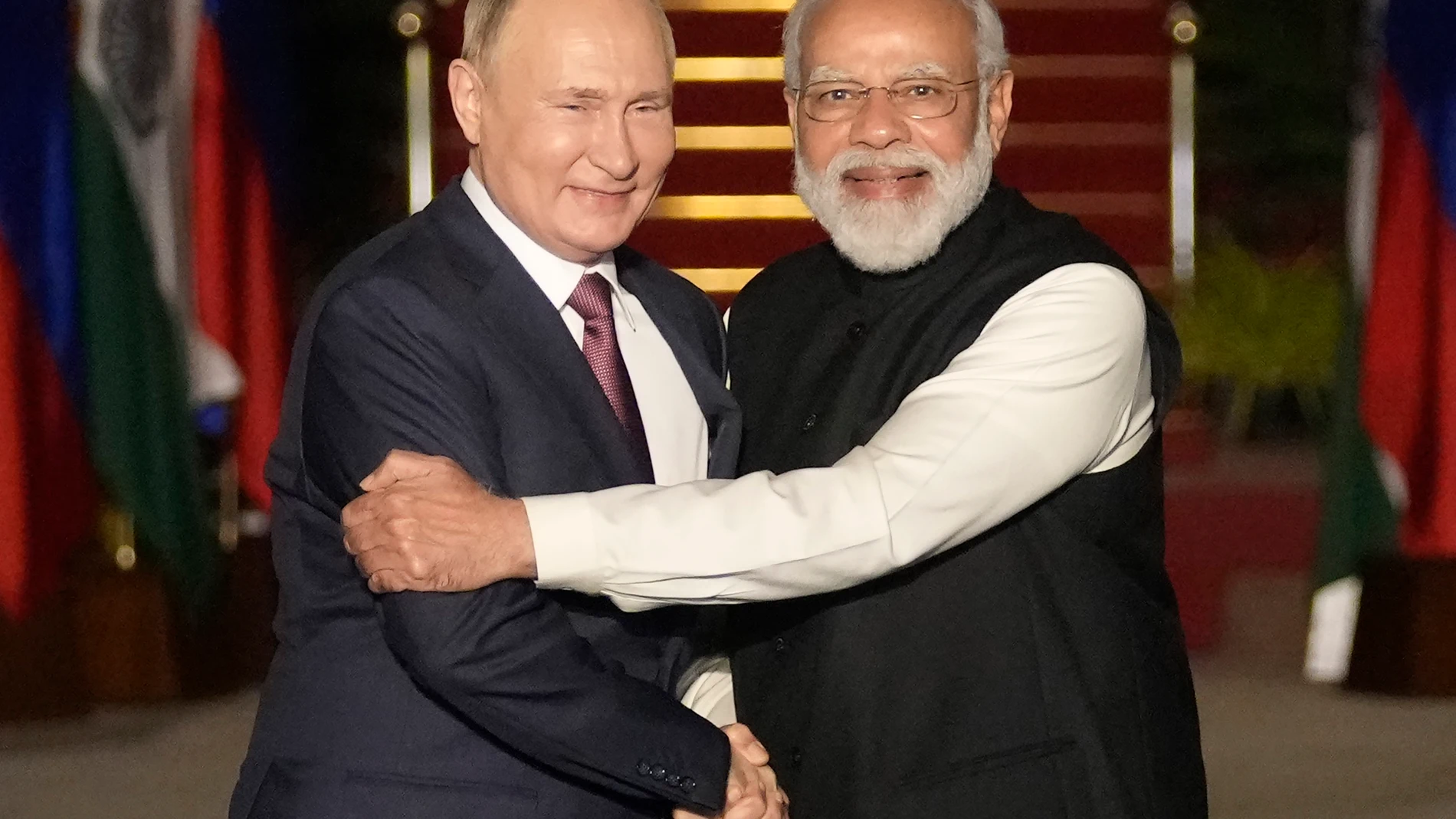FILE - Russian President Vladimir Putin, left, and Indian Prime Minister Narendra Modi greet each other before their meeting in New Delhi, India on Dec. 6, 2021. Modi on Monday begins a two-day visit to Russia that is his first since Moscow sent troops into Ukraine, a conflict that has complicated the relationship between the longtime allies by pushing Russia closer to India's rival China. (AP Photo/Manish Swarup, File)