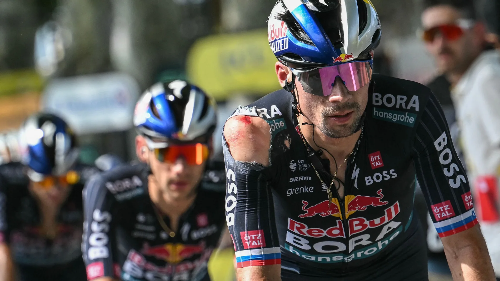 11 July 2024, France, Villeneuve-Sur-Lot: Primoz Roglic from Slovenia of the Red Bull - BORA - hansgrohe team crosses the finish line of stage 12 with visible injuries sustained in a crash in the final kilometers of the stage. Photo: Marco Bertorello/AFP/dpa 11/07/2024 ONLY FOR USE IN SPAIN