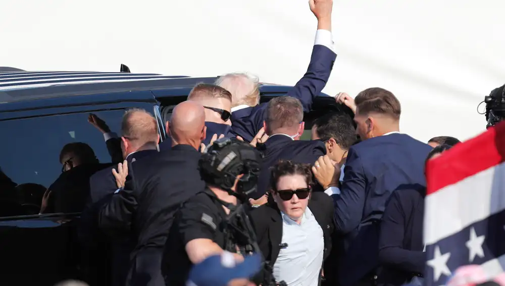 Former US President Donald Trump rushed off stage after incident at campaign rally