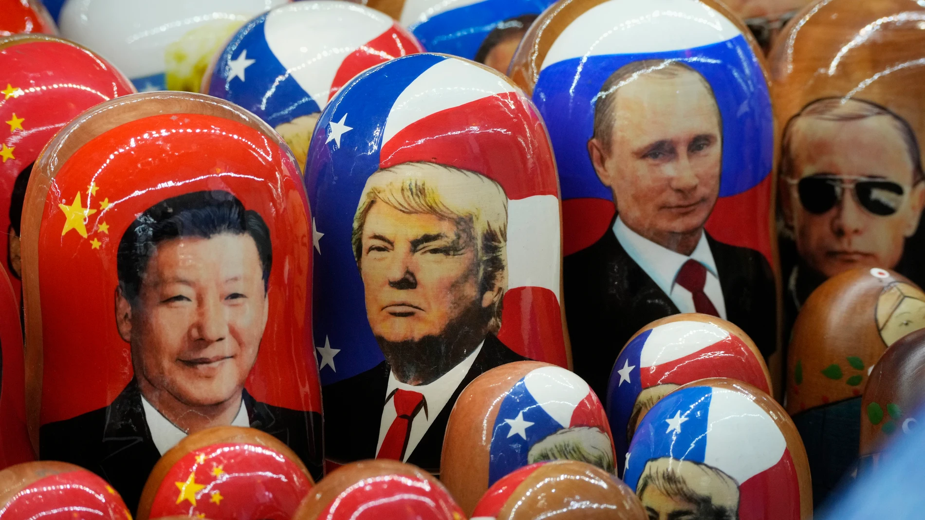 Traditional Russian wooden dolls called Matryoshka depicting China's President Xi Jinping, U.S. President-elect Donald Trump and Russian President Vladimir Putin are displayed for sale at a souvenir shop in St. Petersburg, Russia, Thursday, Nov. 21, 2024. (AP Photo/Dmitri Lovetsky)
