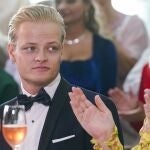 (FILES) Picture taken on June 16, 2022 in Oslo, Norway, shows Marius Borg Høiby sitting next to his mother Norwegian Crown Princess Mette-Marit. - Norwegian police said on November 19, 2024 that the 27-year-old son of Norwegian Crown Princess Mette-Marit had been arrested on suspicion of rape. Police said in a statement that Marius Borg Hoiby, who was born from a relationship prior to Mette-Marit's 2001 marriage to Crown Prince Haakon, had been arrested on November 18, 2024 and was suspected of violating the criminal code "which concerns sexual intercourse with someone who is unconscious or for other reasons unable to resist the act." (Photo by Lise Åserud / NTB / AFP) / Norway OUT / NORWAY OUT