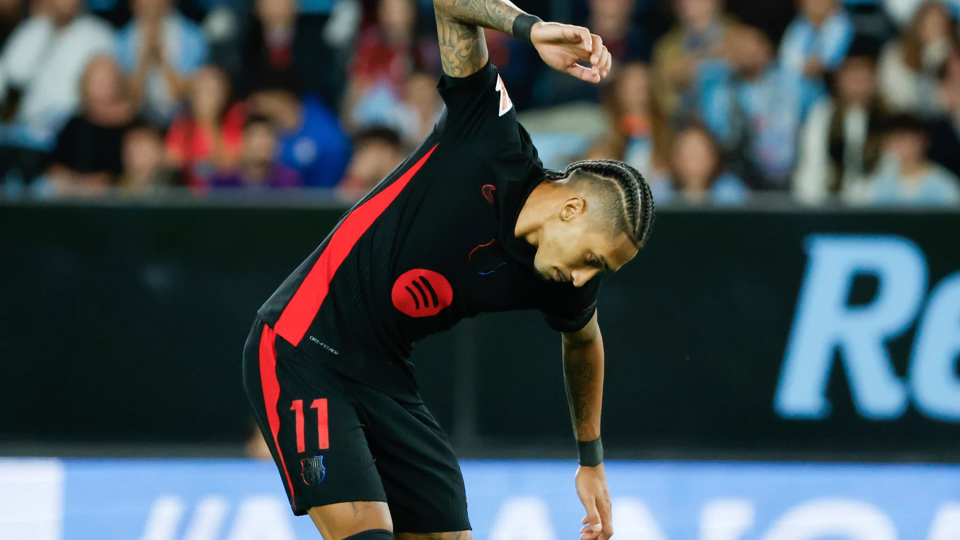 Barcelona's Raphinha reacts after the Spanish La Liga soccer match between Celta Vigo and Barcelona at the Balaidos stadium in Vigo, Spain, Saturday, Nov. 23, 2024. (AP Photo/Lalo R. Villar)