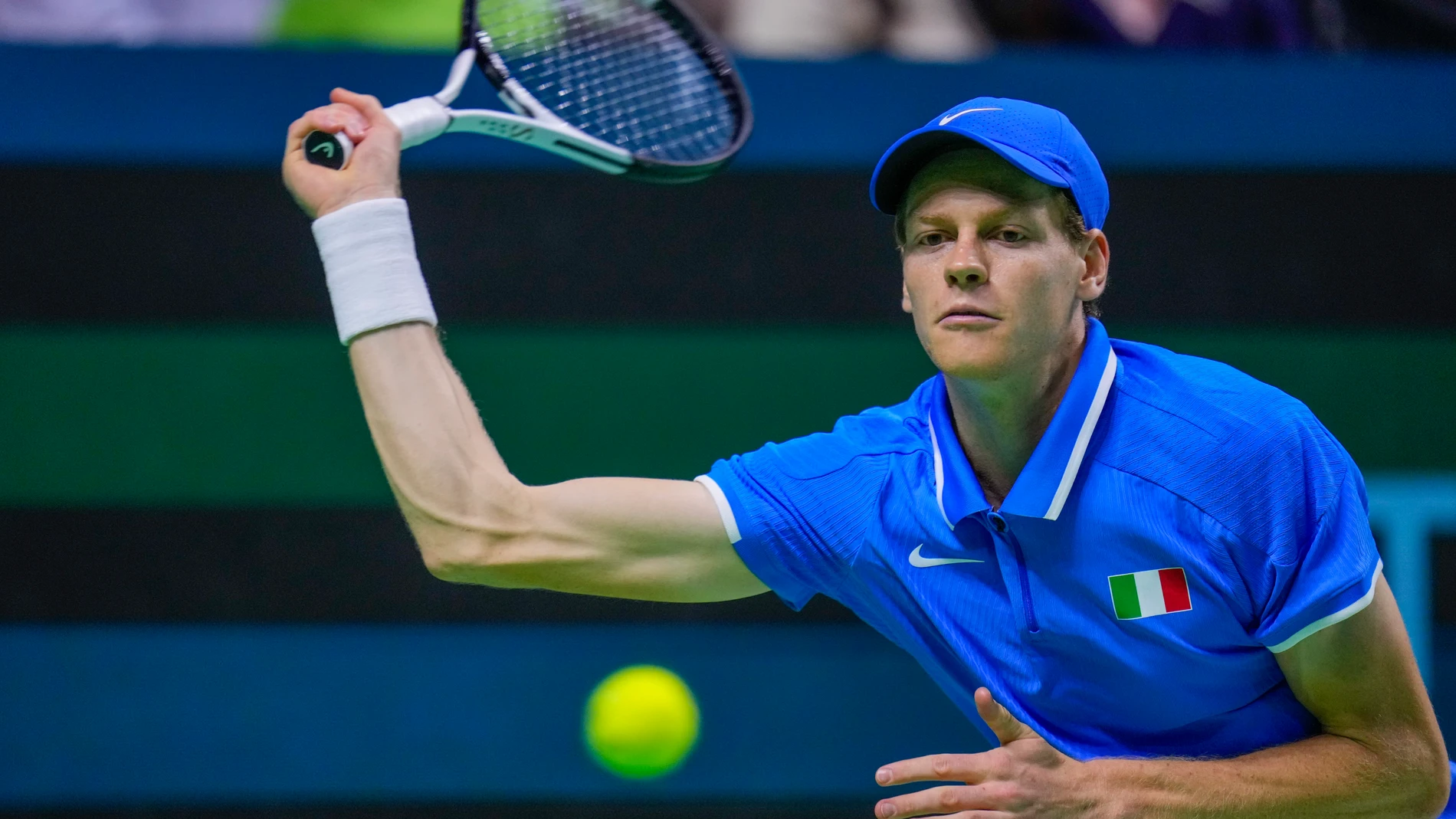 Italy's Jannik Sinner returns the ball to Netherlands' Tallon Griekspoor during the Davis Cup final tennis match between Netherlands and Italy at the Martin Carpena Sports Hall in Malaga, southern Spain, Sunday, Nov. 24, 2024. (AP Photo/Manu Fernandez)