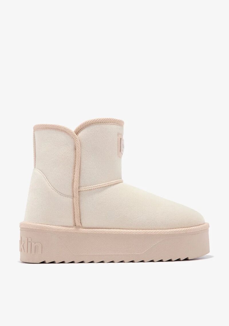 Botas en beige.