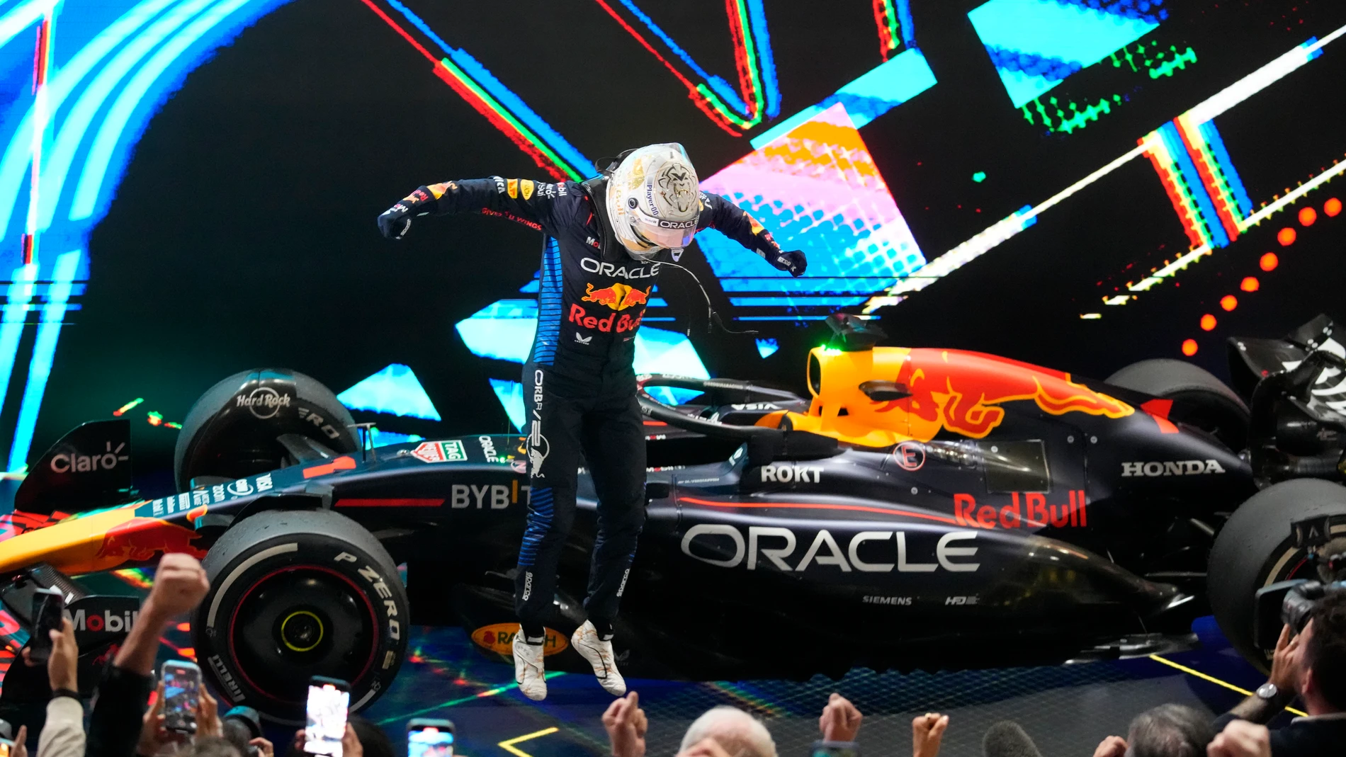 Red Bull driver Max Verstappen of the Netherlands celebrates after winng the Qatar Formula One Grand Prix at the Lusail International Circuit in Lusail, Qatar, Sunday, Dec. 1, 2024. (AP Photo/Darko Bandic)