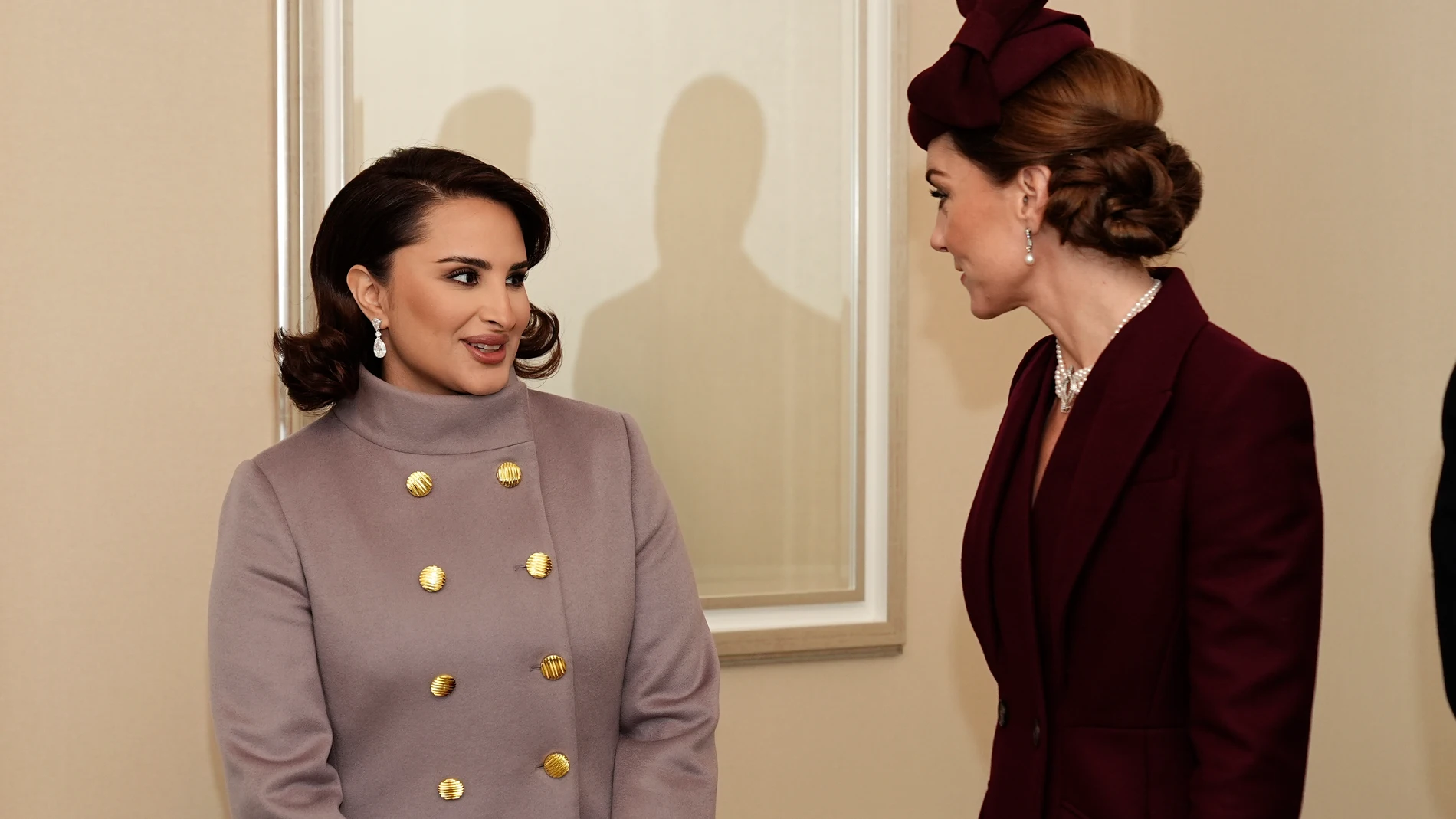 Kate, Princess of Wales, right, greets Sheikha Jawaher, wife of the Emir of Qatar Sheikh Tamim bin Hamad Al Thani, not pictured, as they meet in London, Tuesday Dec. 3, 2024. (Aaron Chown/PA via AP, Pool)