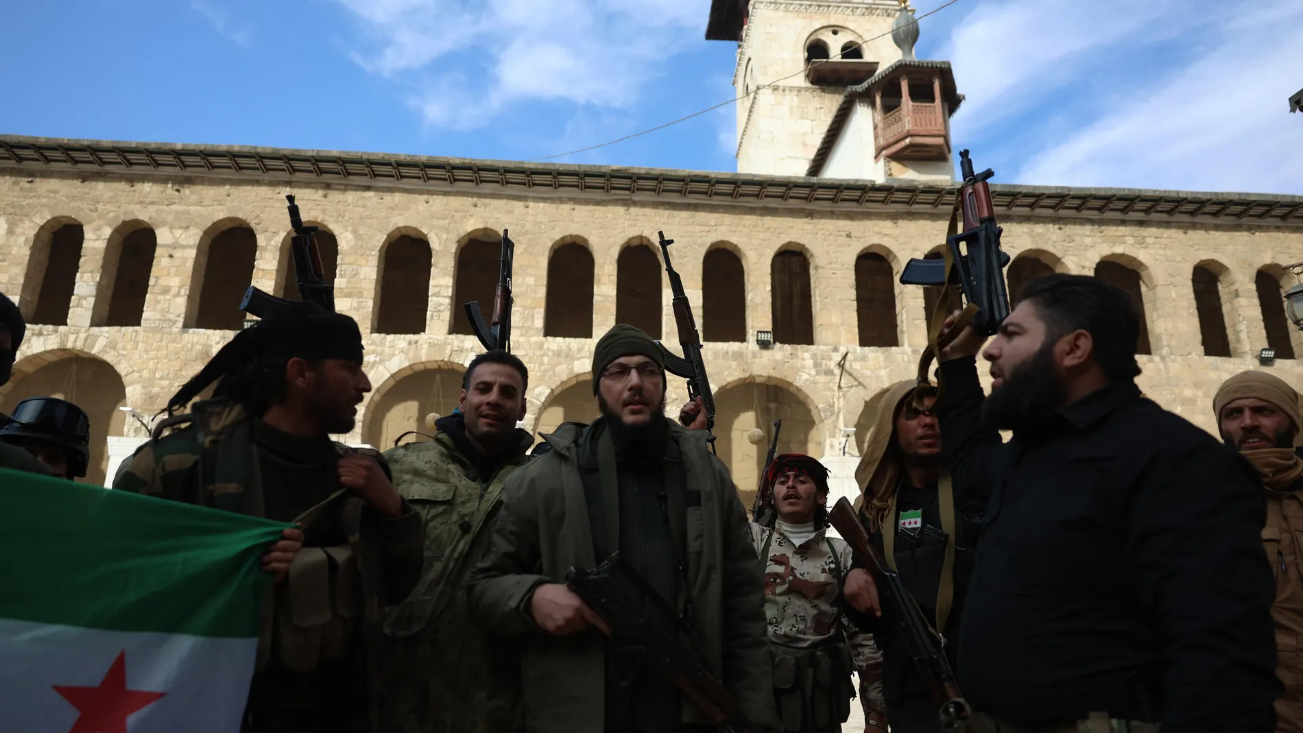 Damascus (Syrian Arab Republic), 08/12/2024.- Syrian rebels celebrate inside the Umayyad Mosque in central Damascus, Syria, 08 December 2024. Syrian rebels entered Damascus on 08 December 2024 and announced in a televised statement the 'Liberation of the city of Damascus and the overthrow of Bashar al-Assad,' as well as the release of all the prisoners. The rebels also urged the Syrian armed forces to leave Syrian public institutions, which will stay under the control of the outgoing Syrian p...