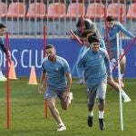 Koke y Griezmann, en el último entrenamiento del Atlético antes de recibir al Sevilla