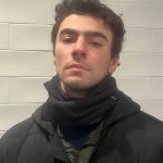 Booking Photo of Healthcare CEO Murder Suspect Luigi Mangione