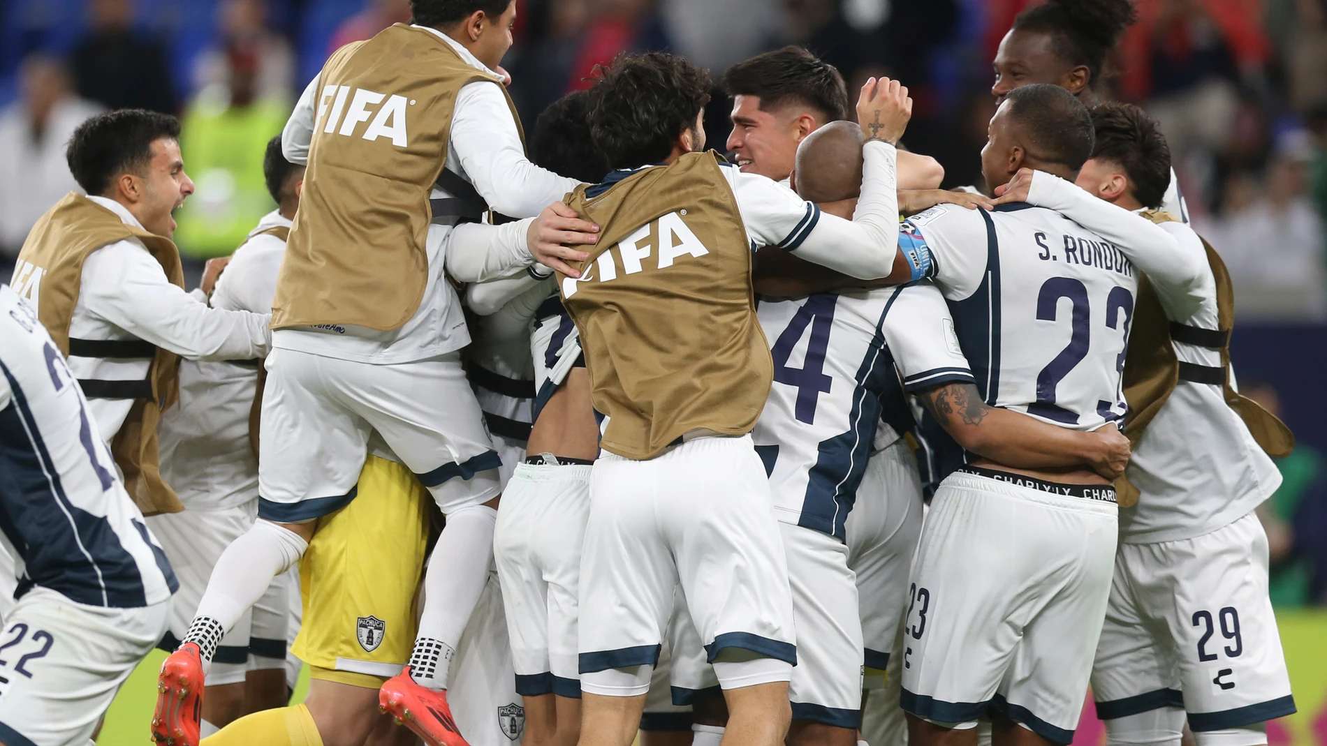 Pachuca's players celebrate after defeating Al Ahly FC in a penalty shootout during the Intercontinental Cup soccer match at Stadium 974 in Doha, Qatar, Saturday, Dec. 14, 2024. (AP Photo/Hussein Sayed)