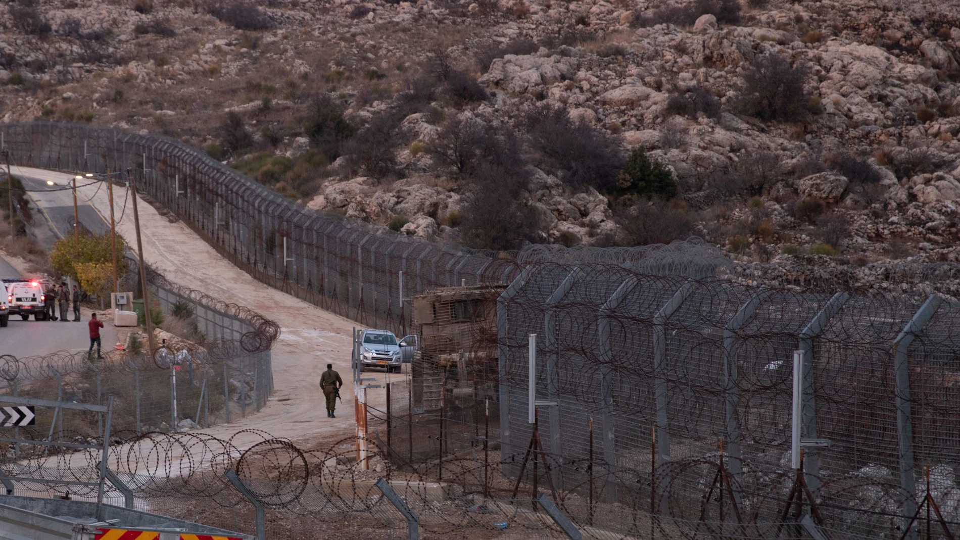 GOLAN HEIGHTS, Dec. 11, 2024 -- Israeli troops are seen near the buffer zone fence on the eastern side of the Golan Heights, on Dec. 10, 2024. Israeli Defense Minister Israel Katz said on Tuesday that Israel was creating a "sterile defense zone" in southern Syria to prevent hostile forces from approaching its borders. Katz added that Israeli forces are "currently completing their deployment in the buffer zone and strategic areas to protect the Golan Heights and Israeli citizens." The ...