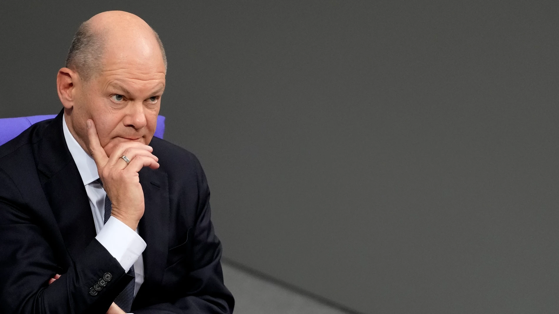 German Chancellor Olaf Scholz attends a plenary session at the German parliament Bundestag where he faces a vote of confidence, Berlin, Germany, Monday, Dec. 16, 2024. (AP Photo/Markus Schreiber)