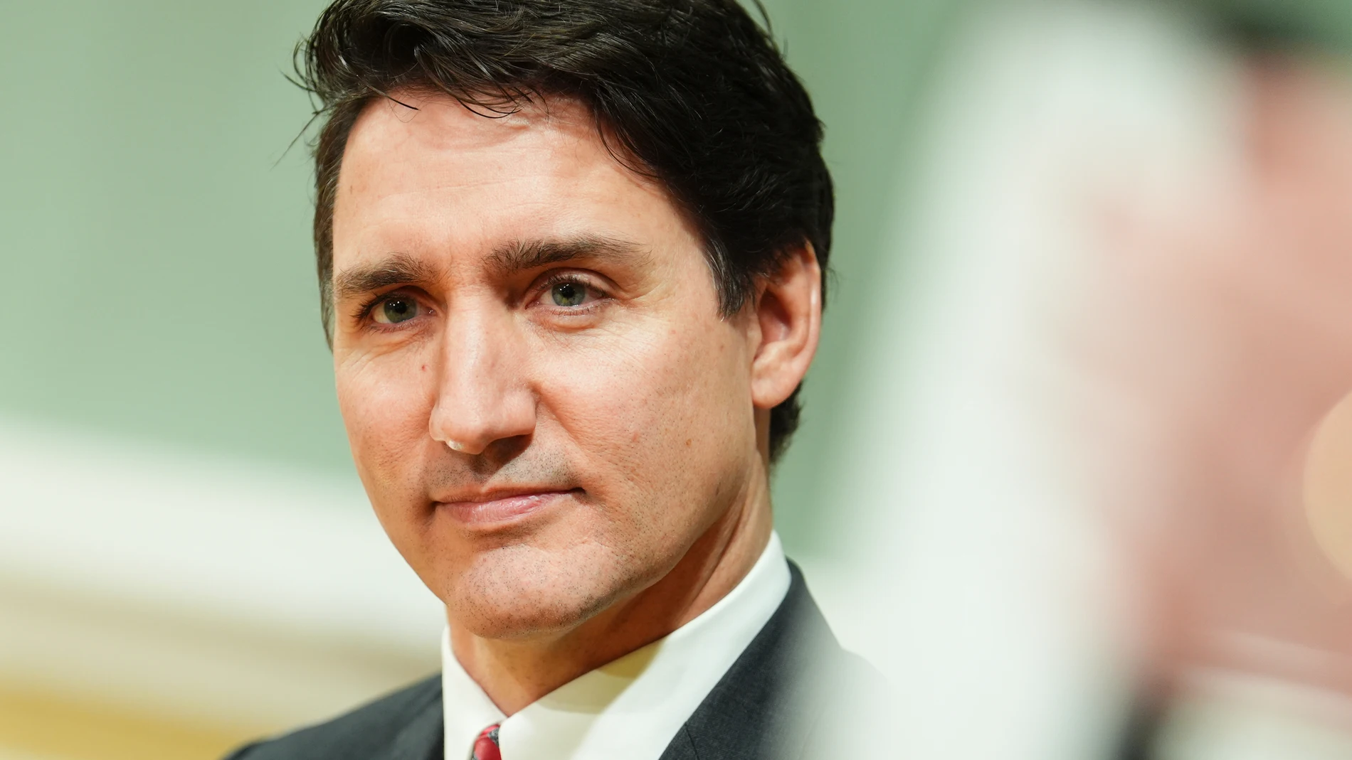 Prime Minister Justin Trudeau looks on during a cabinet swearing-in ceremony at Rideau Hall in Ottawa, on Friday, Dec.20, 2024.(Sean Kilpatrick /The Canadian Press via AP)