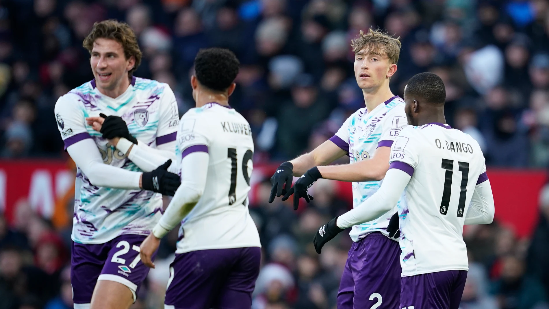 Bournemouth's Dean Huijsen celebrates after scoring his side's first goal during the English Premier League soccer match between Manchester United and Bournemouth at the Old Trafford stadium in Manchester, England, Sunday, Dec. 22, 2024. (AP Photo/Dave Thompson)