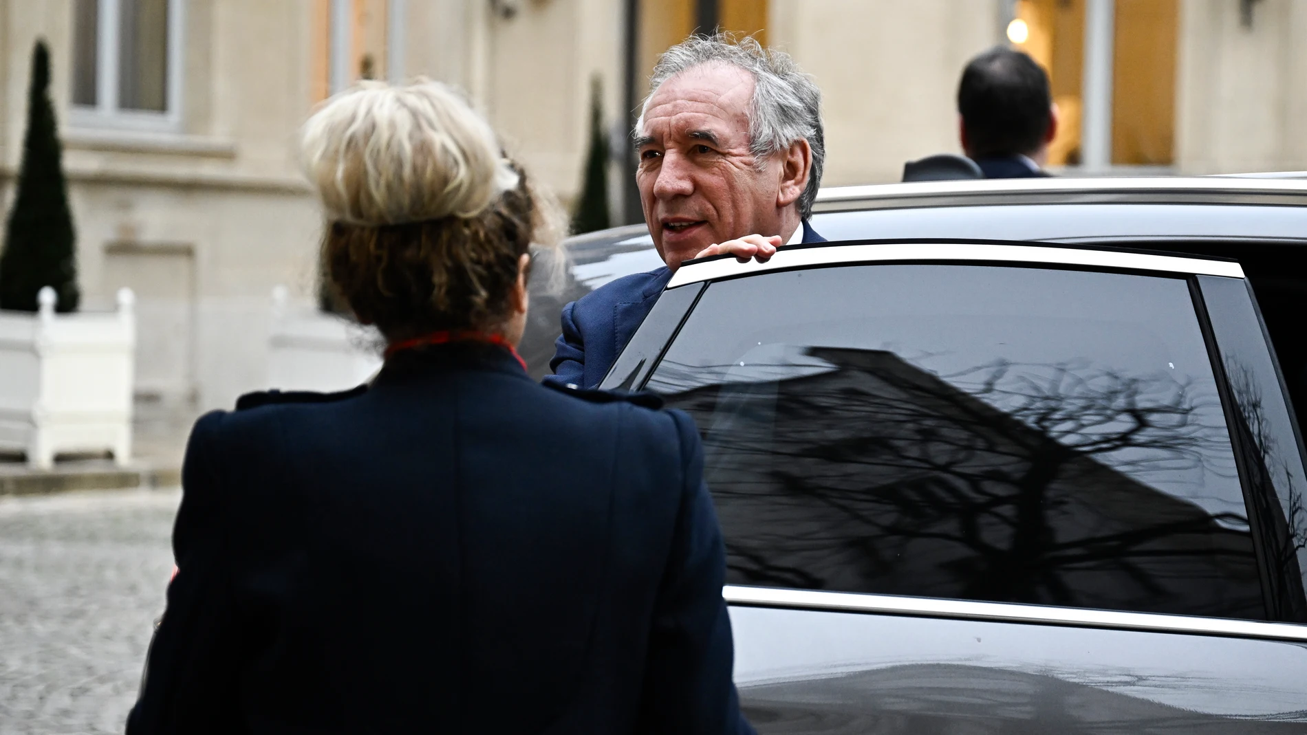 French Prime Minister Francois Bayrou arrives for a meeting at a crisis centre at the Interior Ministry in Paris, Monday Dec. 23, 2024, following the cyclone Chido's passage over the French Indian Ocean territory of Mayotte. French President Emmanuel Macron's office announced a new government Monday, after the previous Cabinet collapsed in a historic vote prompted by fighting over the country's budget. (Julien de Rosa, Pool via AP)