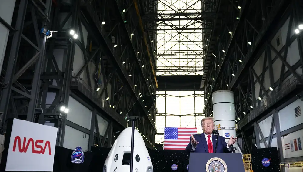 US President Donald Trump speaks after the launch of the SpaceX Falcon 9 rocket and Crew Dragon spacecraft on NASA's SpaceX Demo-2 mission to the International Space Station from NASA's Kennedy Space Center in Cape Canaveral, Florida on May 30, 2020. Trump travels to Kennedy Space Center in Florida to watch the launch of the