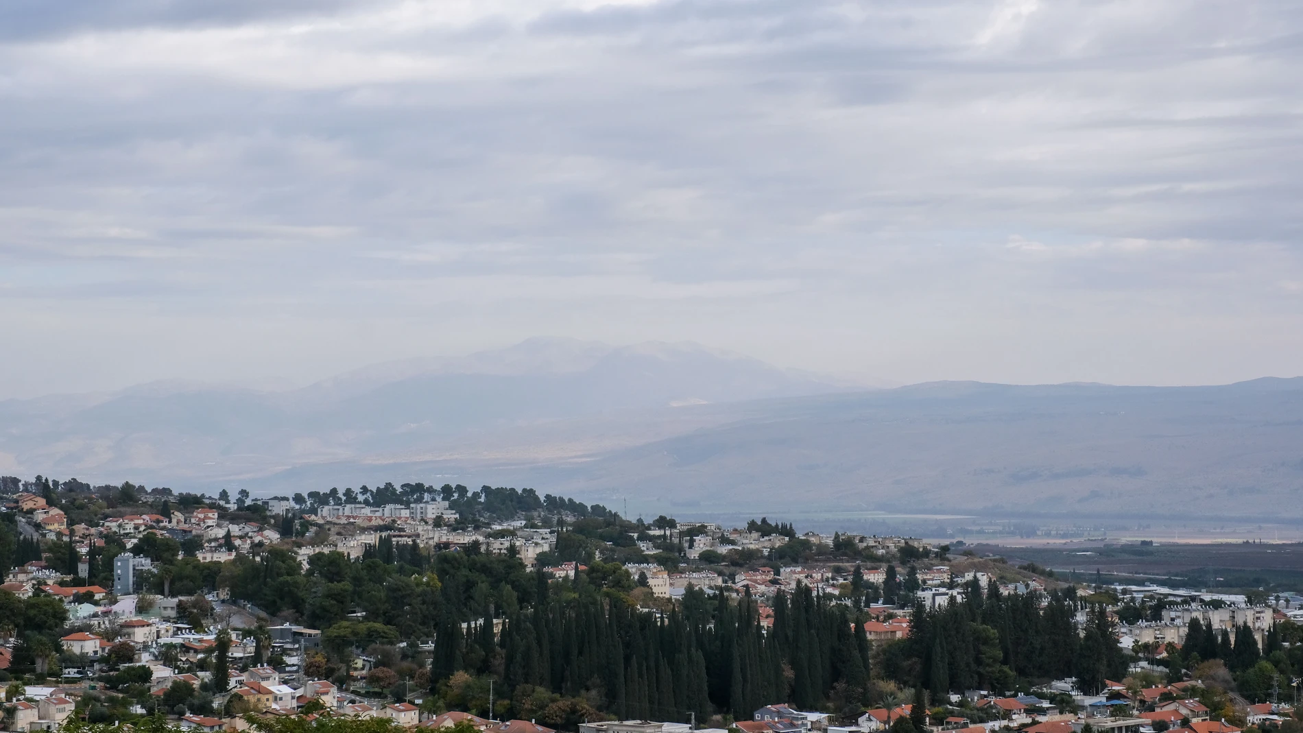 December 20, 2024, Rosh Pina, Israel: A northward view from the Israeli town of Rosh Pina in the Upper Galilee displays the Syrian Hermon, the highest peak on the far horizon and illustrates its strategic military importance as it dominates large parts of Israel. The IDF has taken over the Syrian side of Mount Hermon to expand the demilitarized buffer zone along the Israeli Syrian border following the fall of Asad's regime. PM Netanyahu recently stated that Israel would remain on the Syrian s...