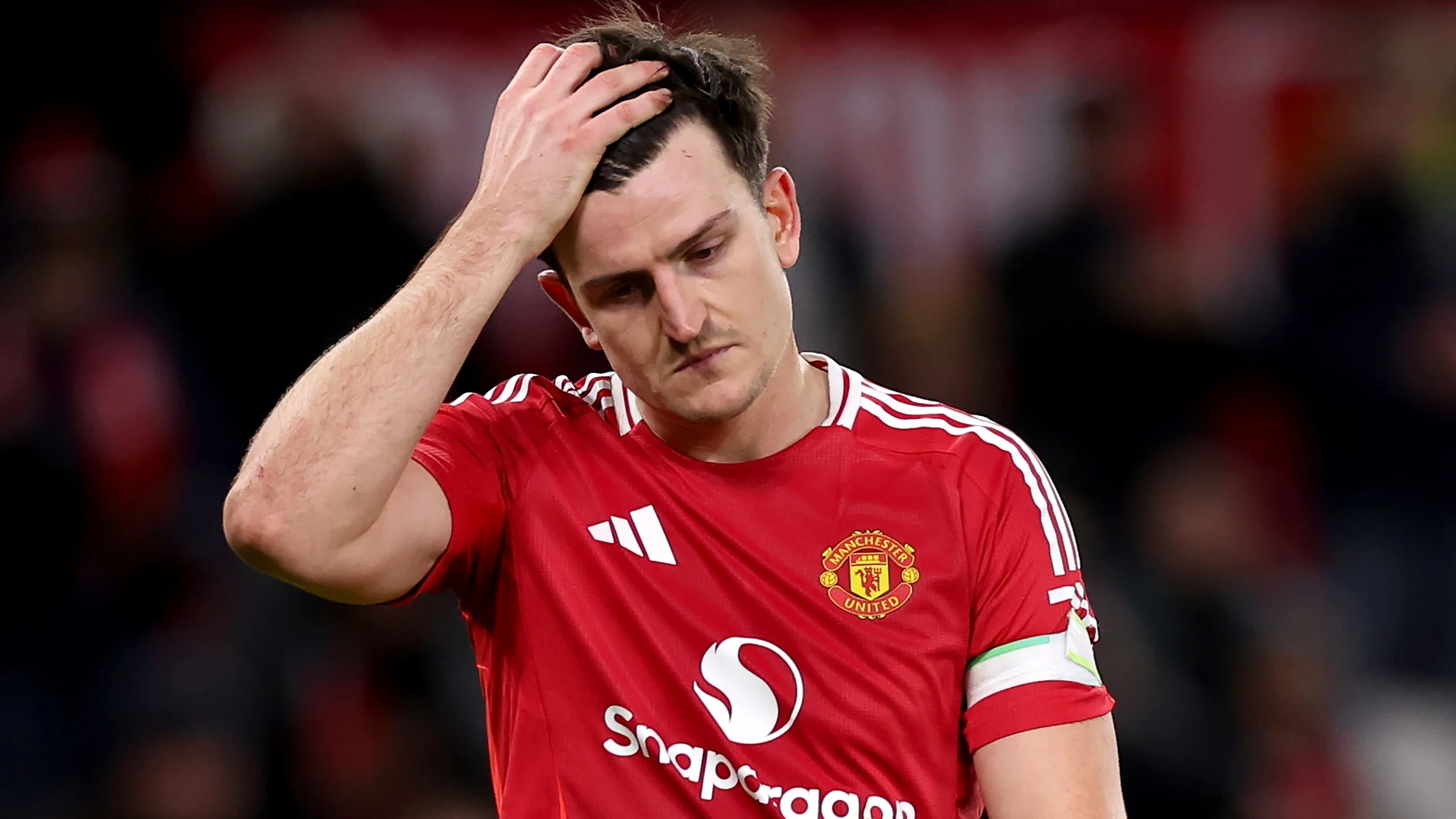 Manchester (United Kingdom), 30/12/2024.- Harry Maguire of Manchester United reacts after the final whistle of the English Premier League match between Manchester United and Newcastle United in Manchester, Britain, 30 December 2024. (Reino Unido) EFE/EPA/ADAM VAUGHAN EDITORIAL USE ONLY. No use with unauthorized audio, video, data, fixture lists, club/league logos, 'live' services or NFTs. Online in-match use limited to 120 images, no video emulation. No use in betting, games or single club/le...