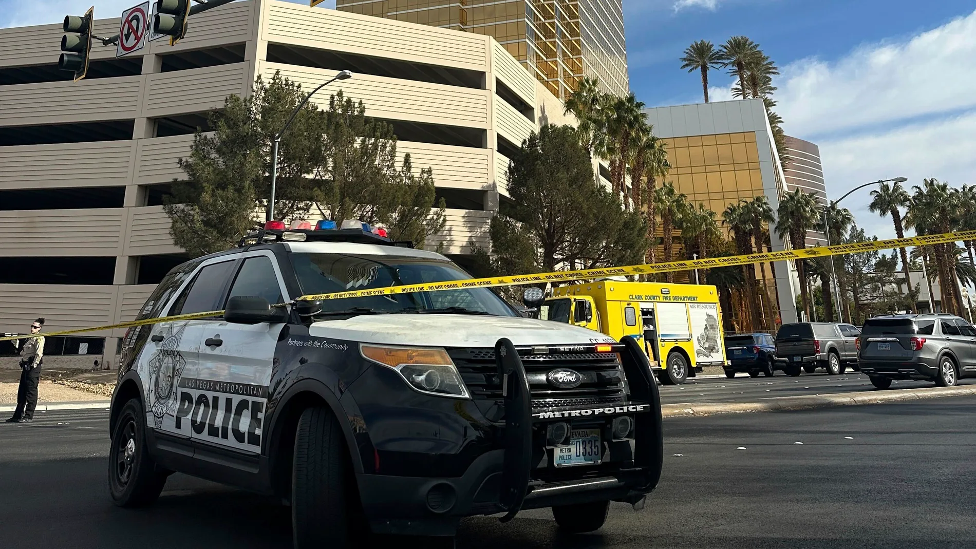Police block the area after a vehicle caught fire and exploded outside the lobby of President-elect Donald Trump's hotel Wednesday, Jan. 1, 2025. (AP Photo/Ty ONeil)