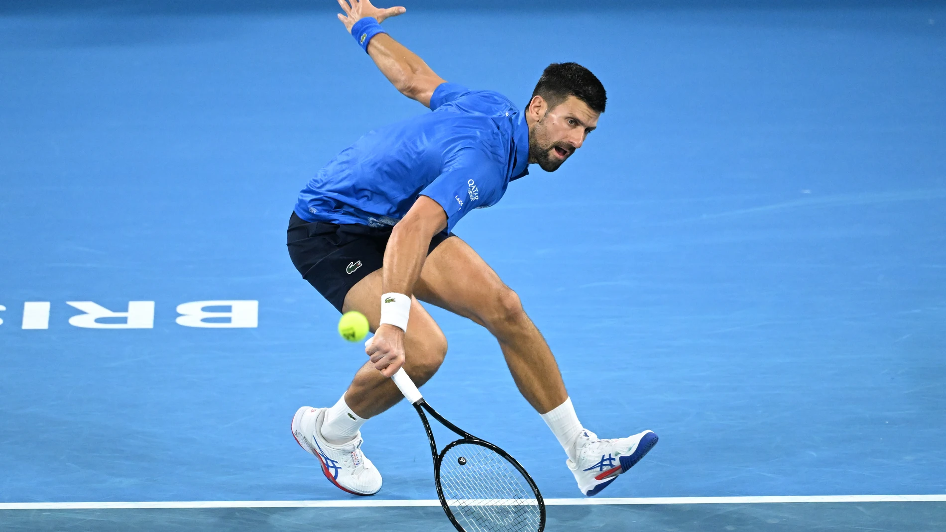 02 January 2025, Australia, Brisbane: Serbian tennis player Novak Djokovic plays a backhand return against France's Gael Monfils during their men's singles tennis match at the Brisbane International tennis tournament. Photo: Darren England/AAP/dpa 02/01/2025 ONLY FOR USE IN SPAIN