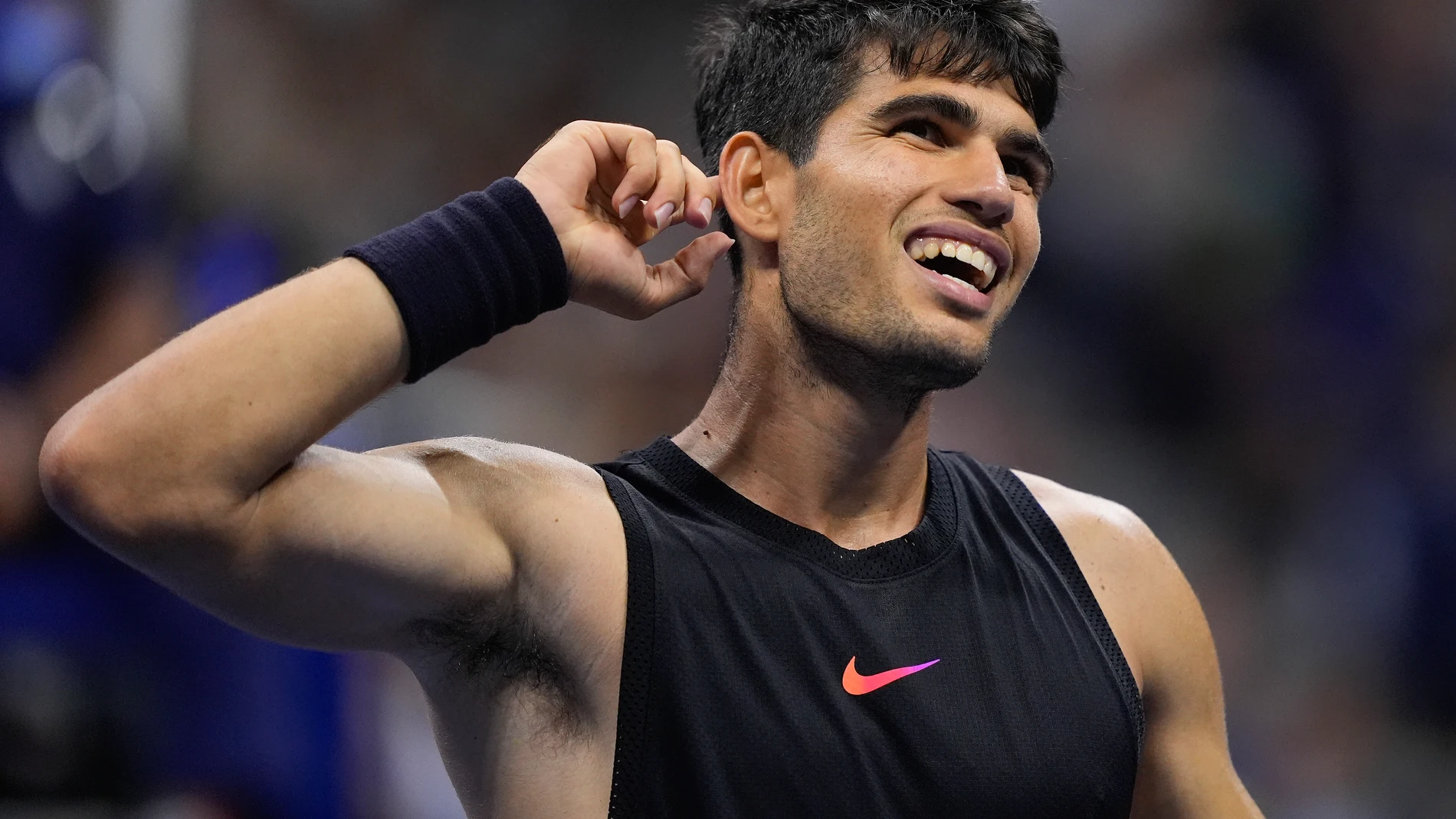 FILE - Carlos Alcaraz, of Spain, reacts during a match against Li Tu, of Australia, during the first round of the U.S. Open tennis championships, Tuesday, Aug. 27, 2024, in New York. (AP Photo/Matt Rourke, File)