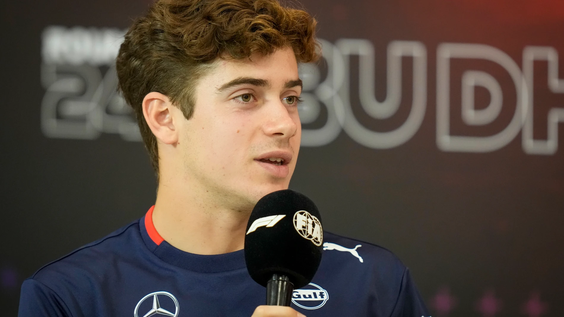 FILE - Williams driver Franco Colapinto of Argentina attends a news conference ahead of the Formula One Abu Dhabi Grand Prix, at the Yas Marina Circuit in Abu Dhabi, UAE, Thursday, Dec. 5, 2024. (AP Photo/Darko Bandic, File)