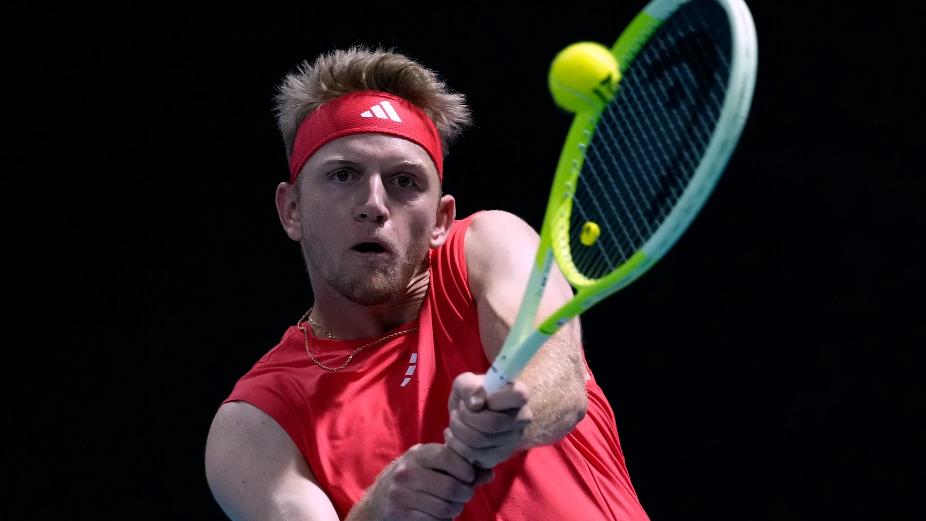 Alejandro Davidovich Fokina of Spain plays a backhand return to Felix Auger-Aliassime of Canada during their second round match at the Australian Open tennis championship in Melbourne, Australia, Wednesday, Jan. 15, 2025. (AP Photo/Asanka Brendon Ratnayake)