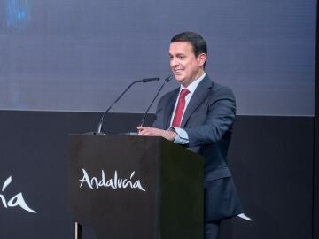 El presidente de la Diputación de Almería, Javier Aureliano García, durante un acto en Fitur