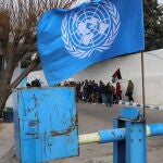 Refugiados palestinos protestan frente a la sede de la UNRWA en Damasco 