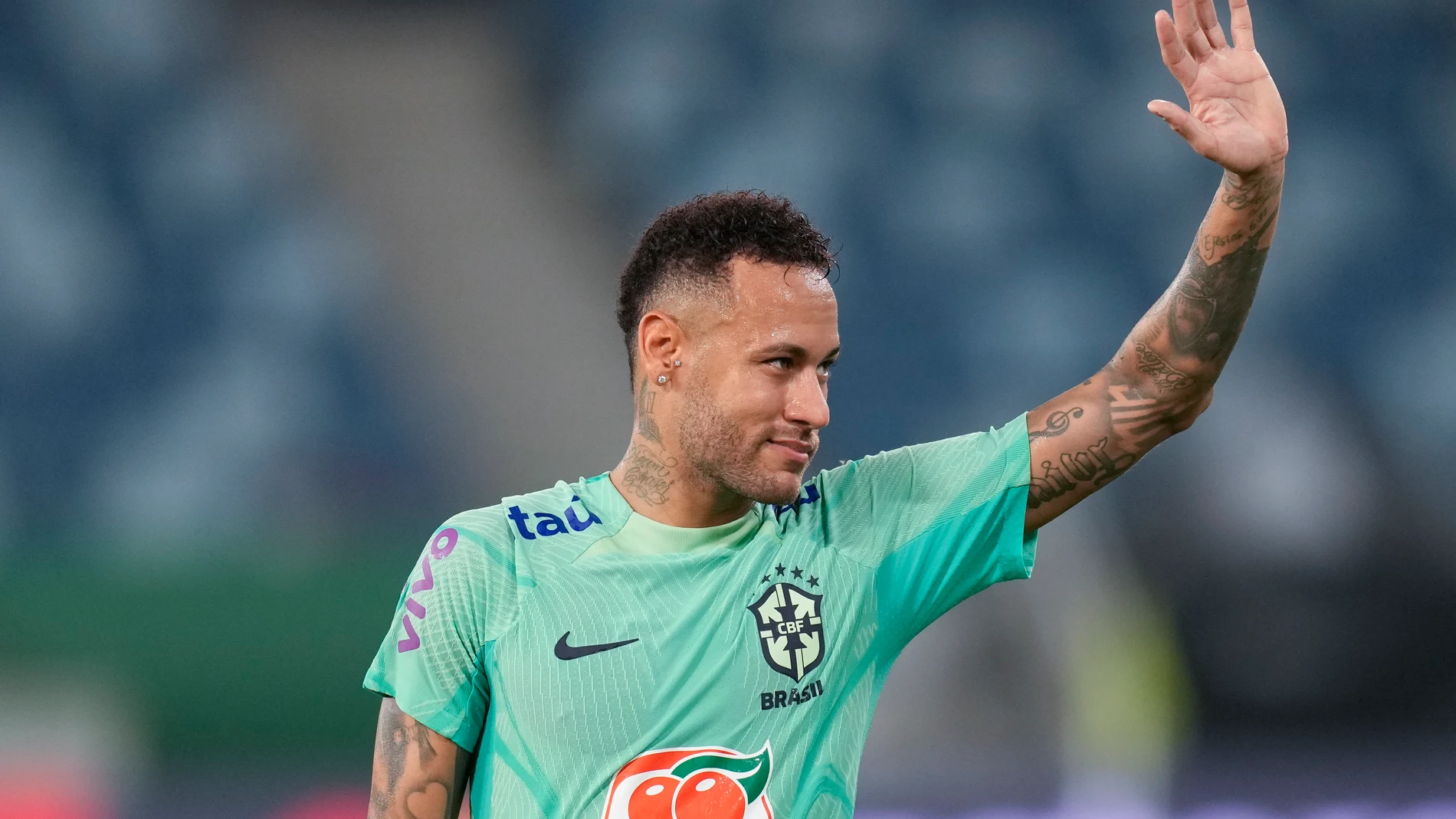 FILE - Brazil's Neymar waves to fans during a training session in Cuiaba, Brazil, Tuesday, Oct. 10, 2023. (AP Photo/Andre Penner, File)