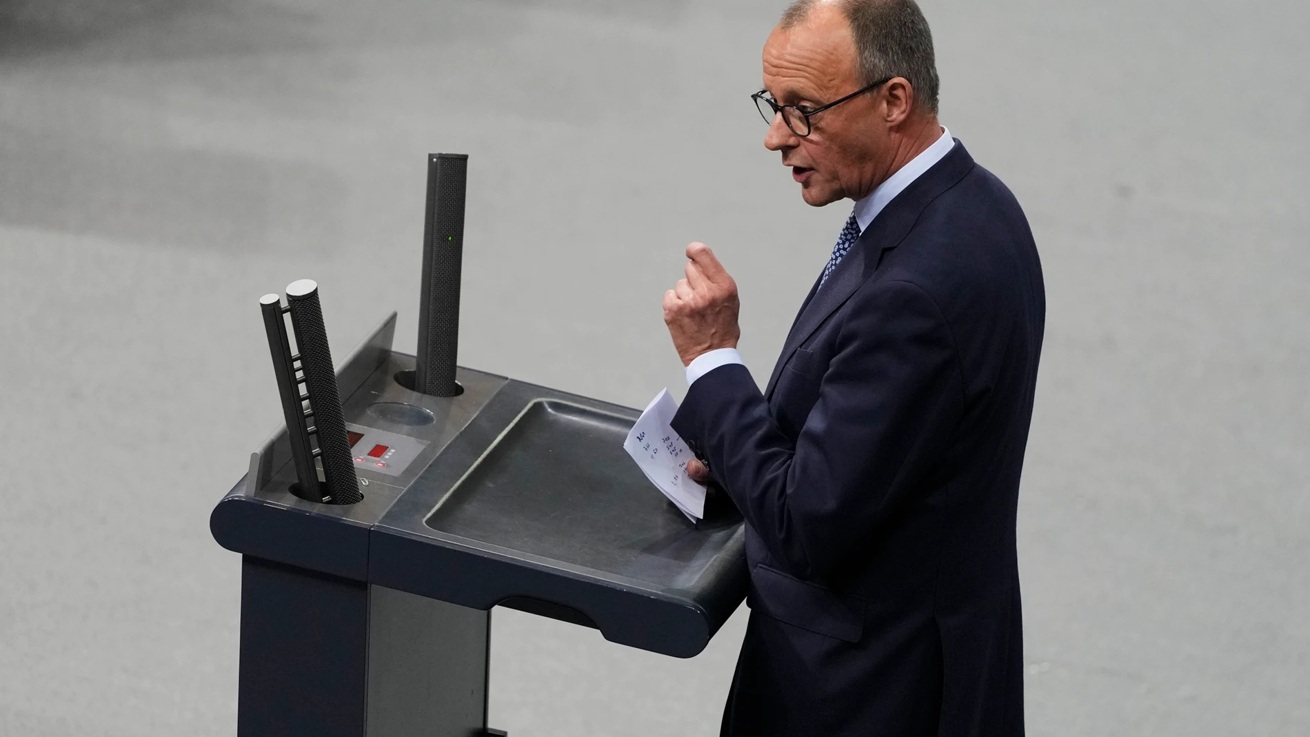 German opposition leader and Christian Union parties floor leader Friedrich Merz speaks after the debate and a voting about migration at the German parliament Bundestag in Berlin, Germany, Wednesday, Jan. 29, 2025. (AP Photo/Markus Schreiber)