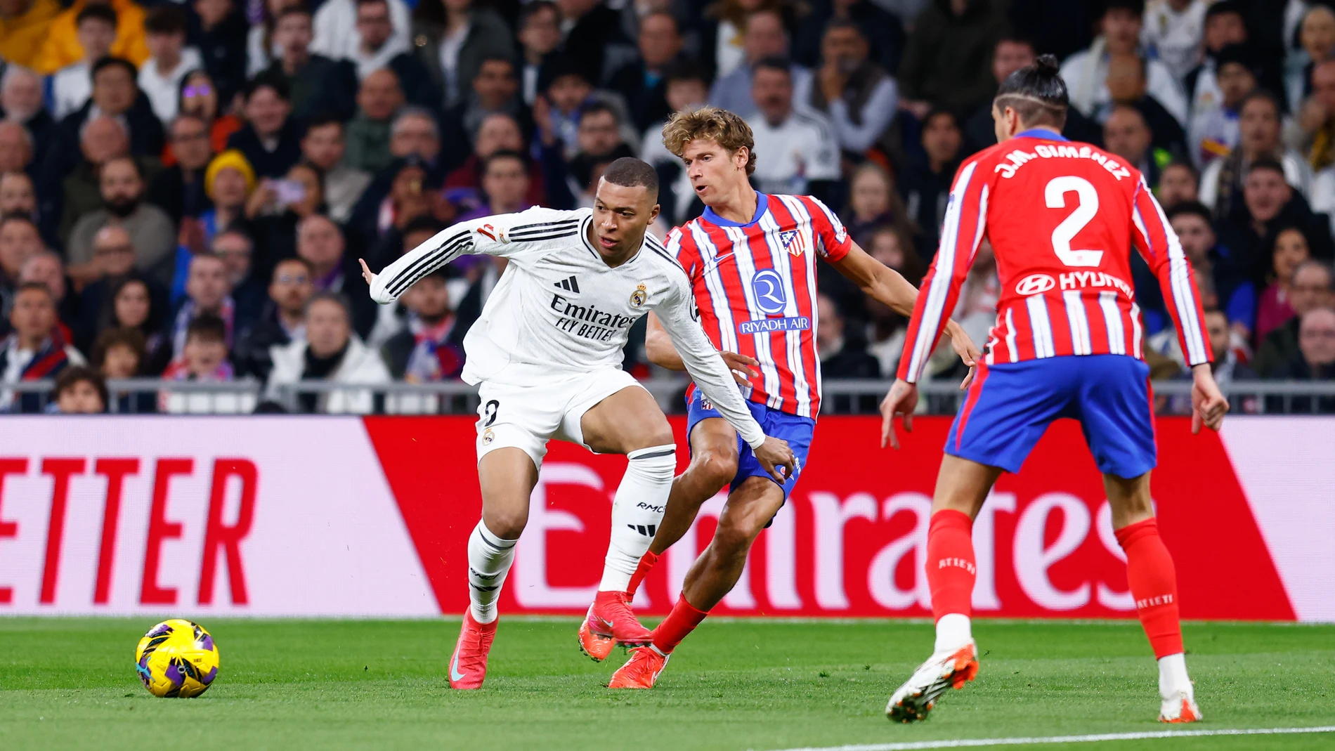 Kylian Mbappe of Real Madrid and Marcos Llorente of Atletico de Madrid in action during the Spanish League, LaLiga EA Sports, football match played between Real Madrid and Atletico de Madrid at Santiago Bernabeu stadium on February 8, 2025, in Madrid, Spain.AFP7 08/02/2025 ONLY FOR USE IN SPAIN