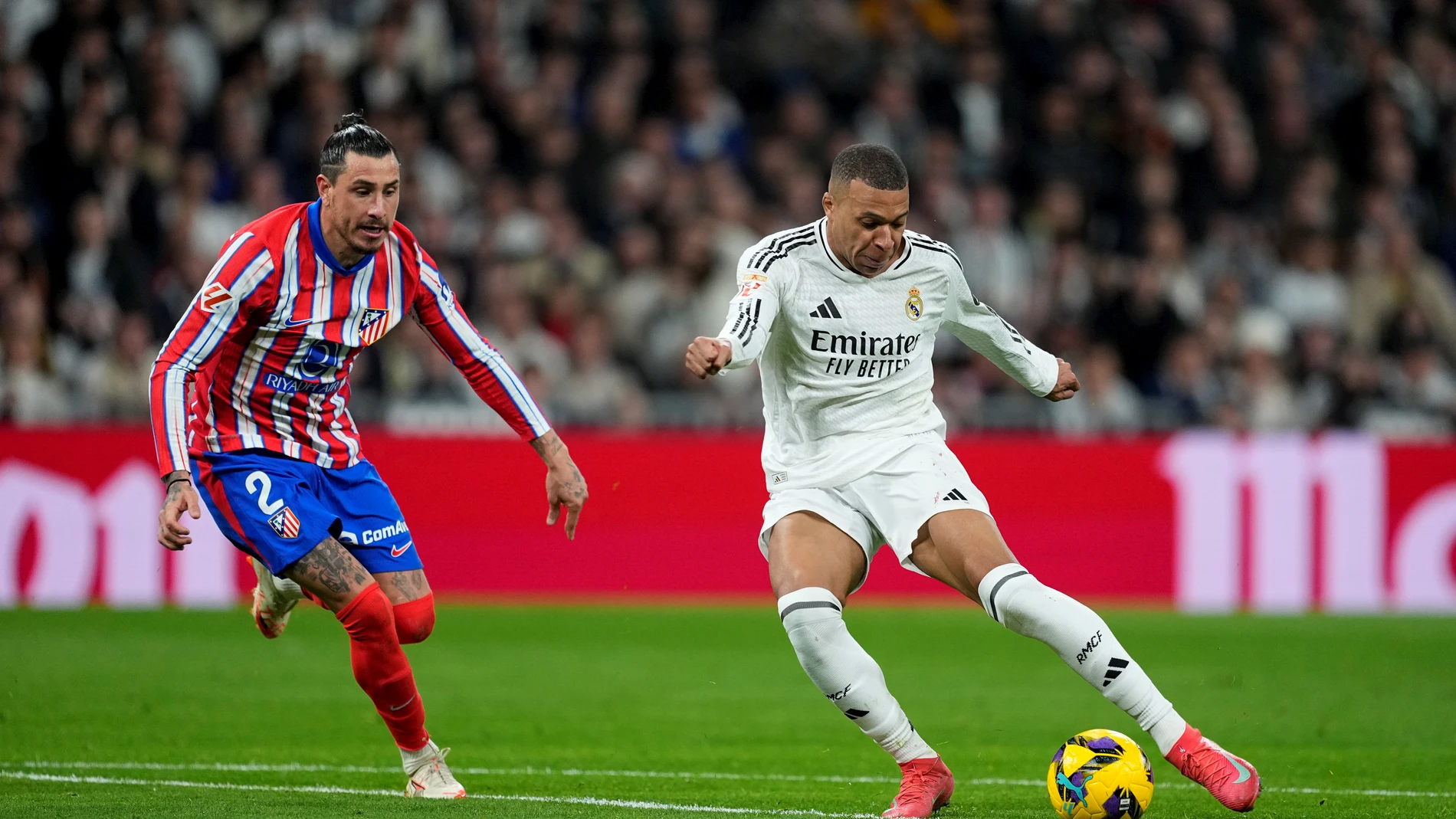 Kylian Mbappe of Real Madrid and Jose Maria Gimenez of Atletico de Madrid in action during the Spanish League, LaLiga EA Sports, football match played between Real Madrid and Atletico de Madrid at Santiago Bernabeu stadium on February 8, 2025, in Madrid, Spain. AFP7 08/02/2025 ONLY FOR USE IN SPAIN