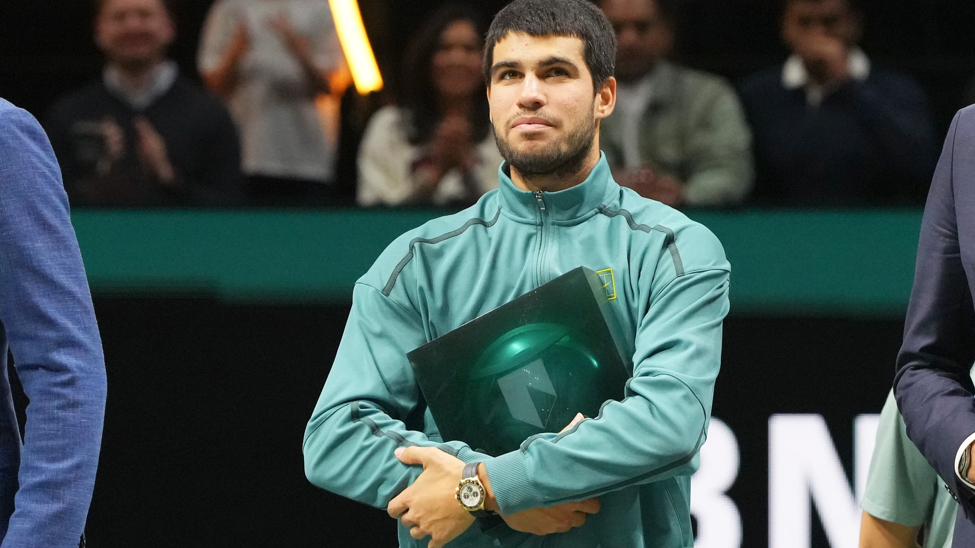Winner Spain's Carlos Alcaraz hold the trophy after the final match against Australia's Alex de Minaur at the ABN AMRO Tennis Tournament in Rotterdam, Netherlands, Sunday, Feb. 9, 2025. (AP Photo/Peter Dejong)