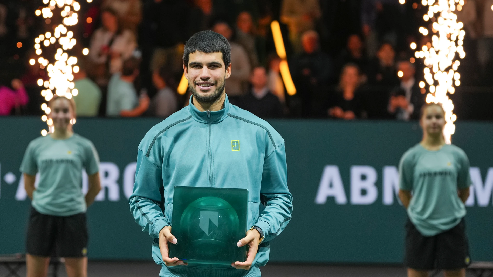 Winner Spain's Carlos Alcaraz poses with the trophy after the final match of the ABN AMRO Tennis Tournament in Rotterdam, Netherlands, Sunday, Feb. 9, 2025. (AP Photo/Peter Dejong)