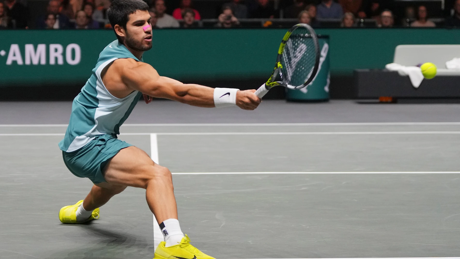 Spain's Carlos Alcaraz returns to Australia's Alex de Minaur during the final match of the ABN AMRO Tennis Tournament in Rotterdam, Netherlands, Sunday, Feb. 9, 2025. (AP Photo/Peter Dejong)
