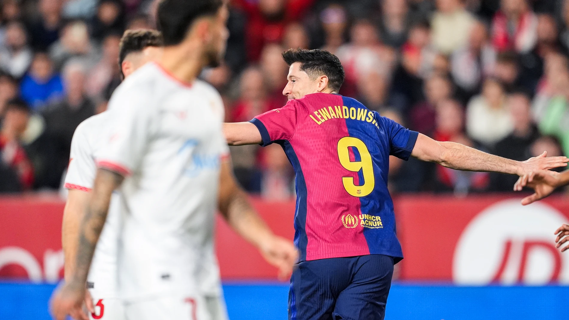 Robert Lewandowski of FC Barcelona celebrates a goal during the Spanish league, LaLiga EA Sports, football match played between Sevilla FC and FC Barcelona at Ramon Sanchez-Pizjuan stadium on February 9, 2025, in Sevilla, Spain.AFP7 09/02/2025 ONLY FOR USE IN SPAIN