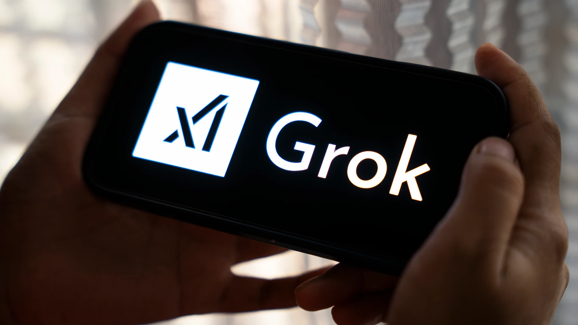 February 12, 2025: New Delhi, India. 12 February 2025 : In this photo illustration Grok, an AI chatbot by xAI, app icon seen in an iPhone screen. Generative AI and modern chatbot tech concept. Europa Press/Contacto/David Talukdar 12/02/2025 ONLY FOR USE IN SPAIN
